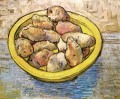 Bodegón Patatas en un plato amarillo Vincent van Gogh